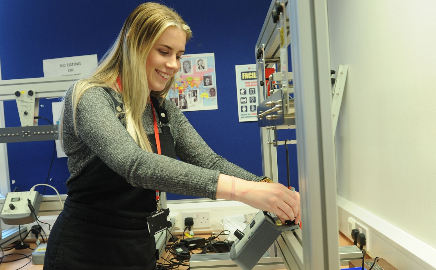 A female student at work in the robotics lab