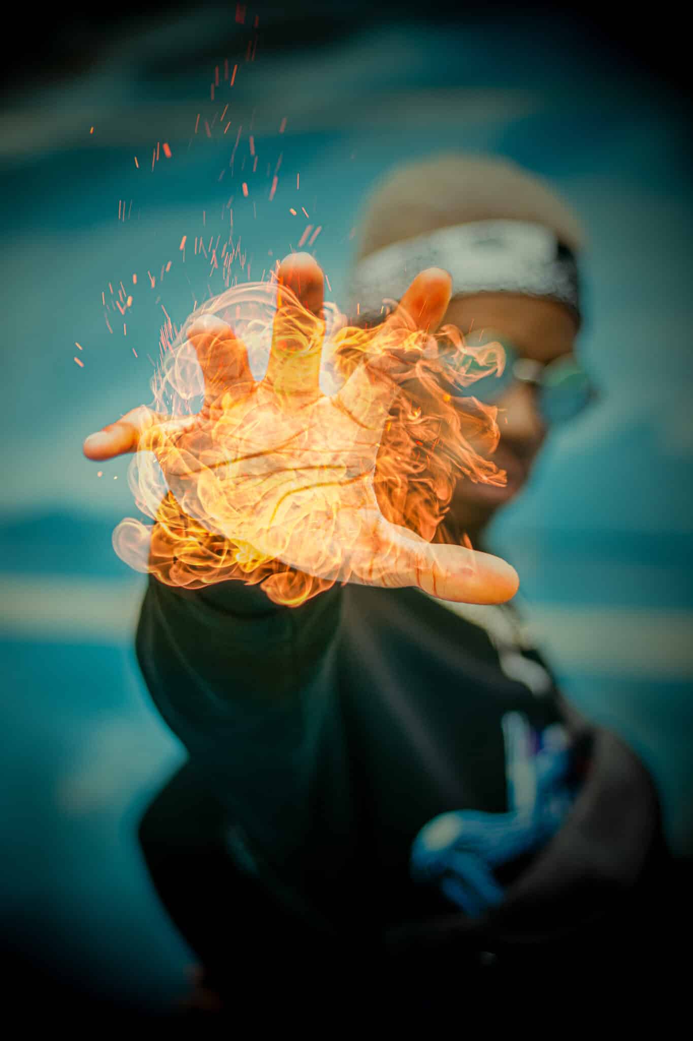 Man with fire in hand