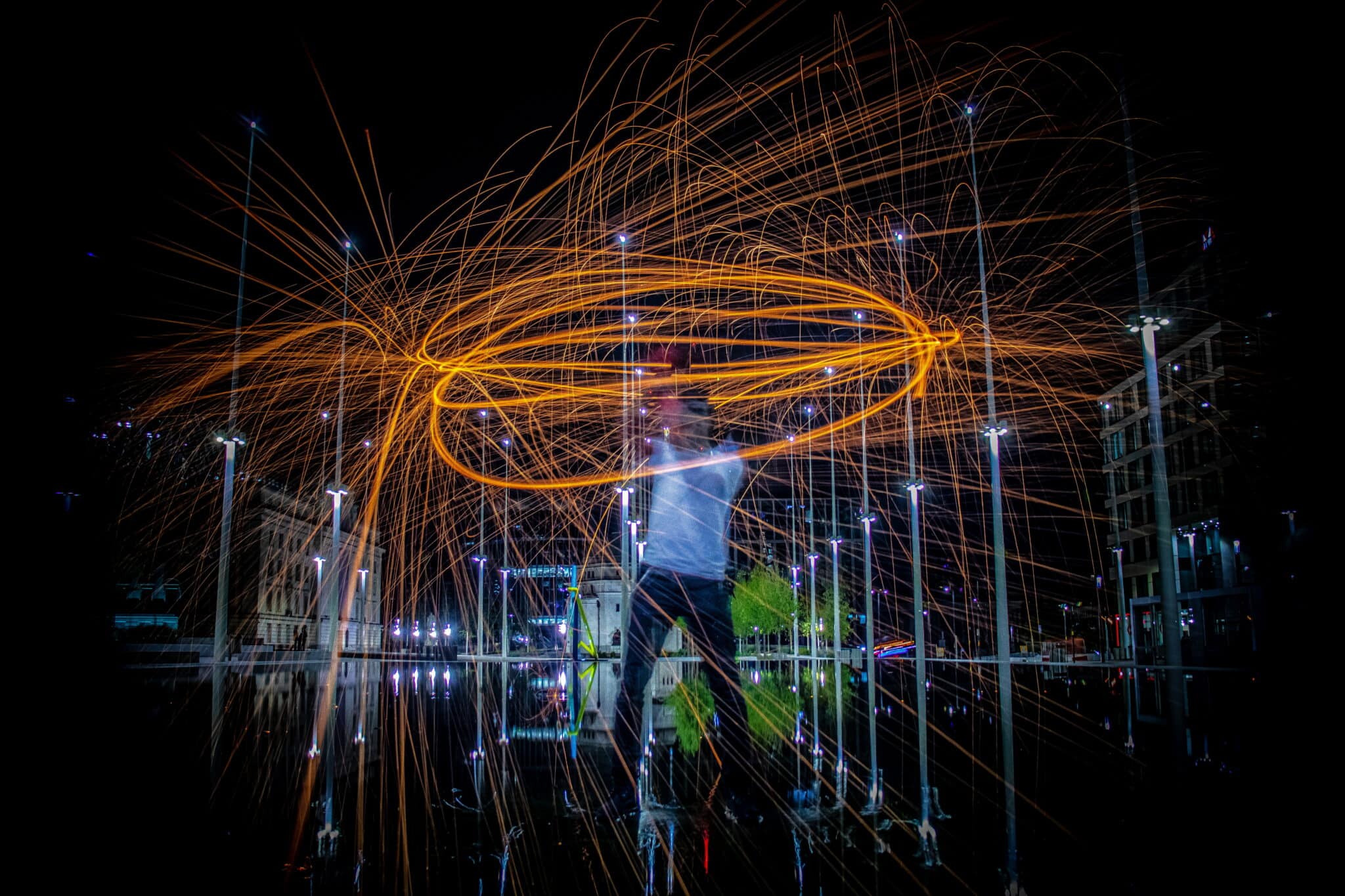 Man at night with sparkler