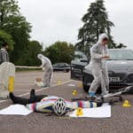 Forensic students investigate road traffic accident simulation