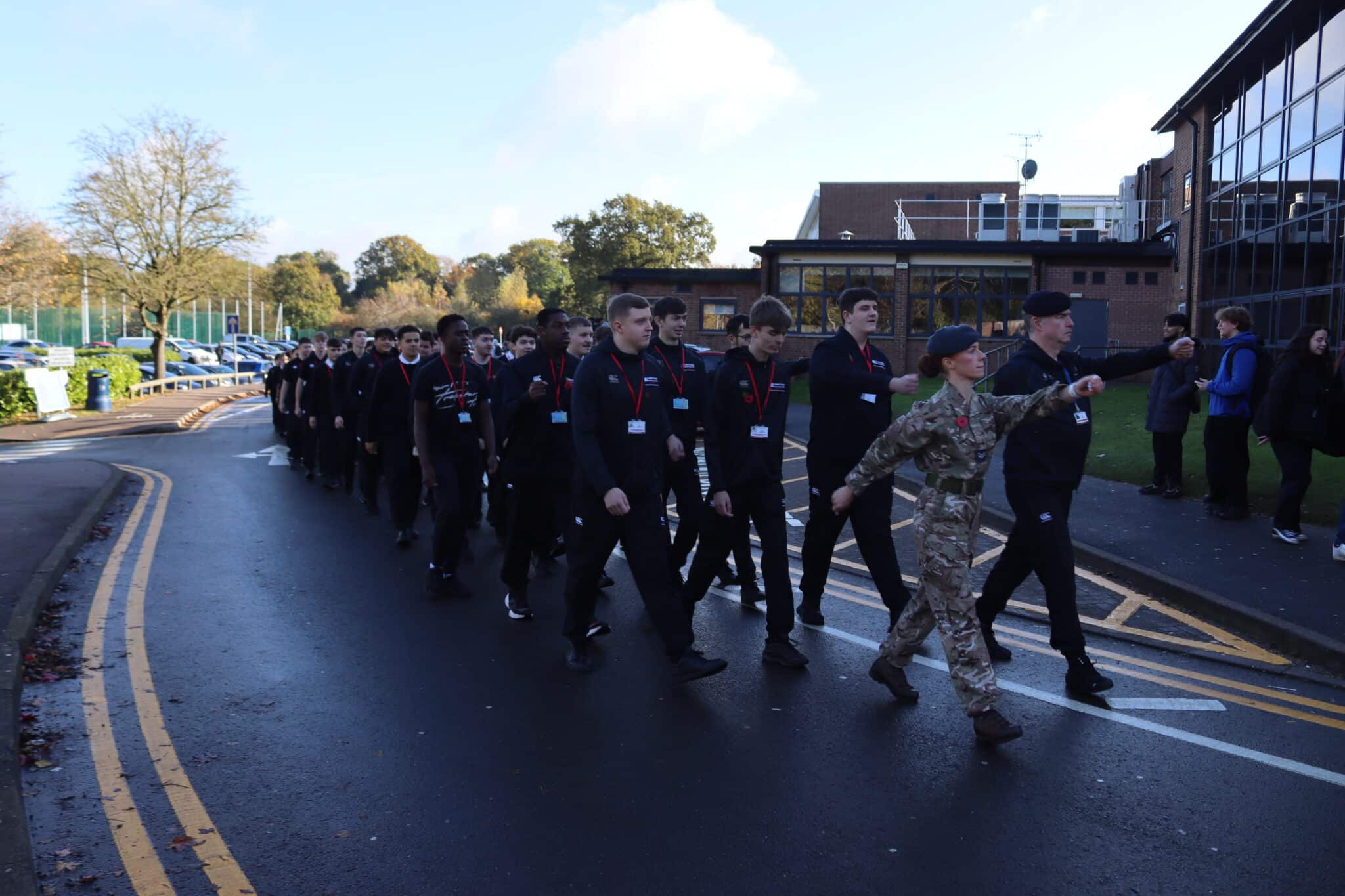 students marching on the annual Remembrance Day parade