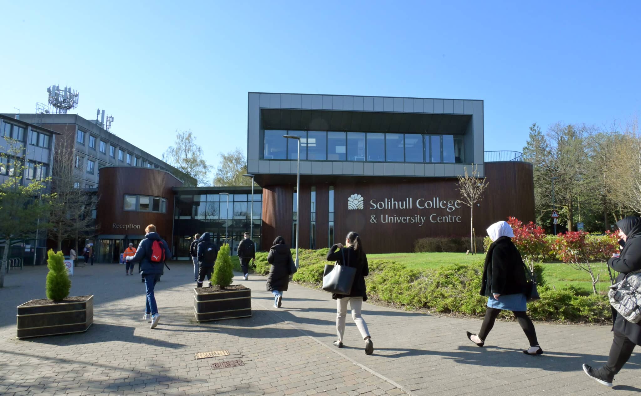 Students arriving at the College's Blossomfield Campus
