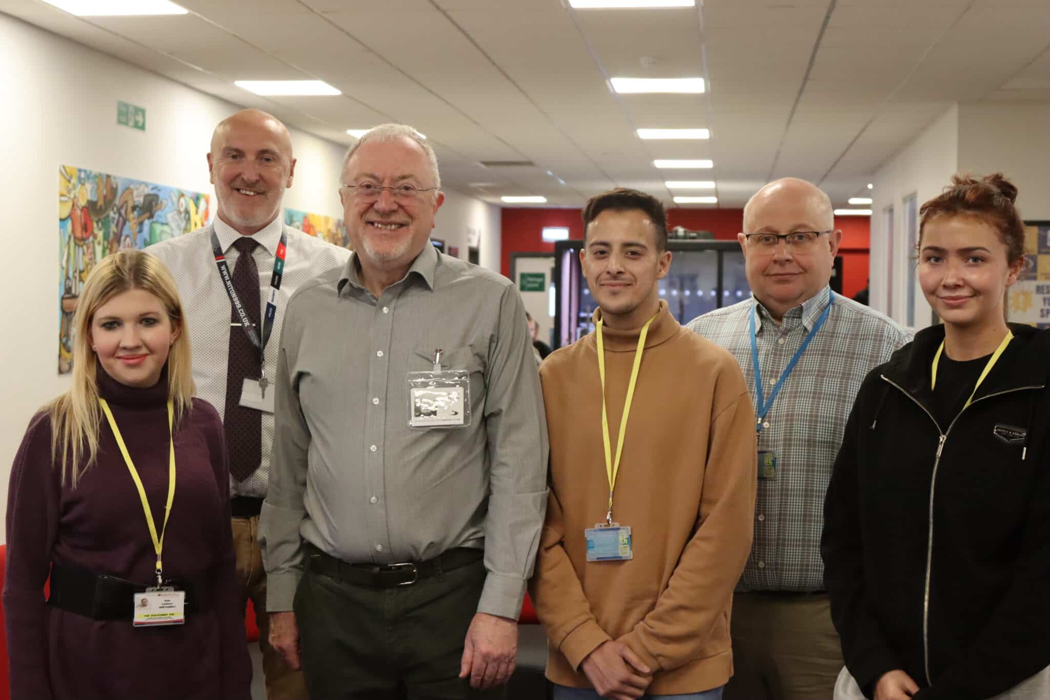 Solihull College people standing in a group: three staff and three students