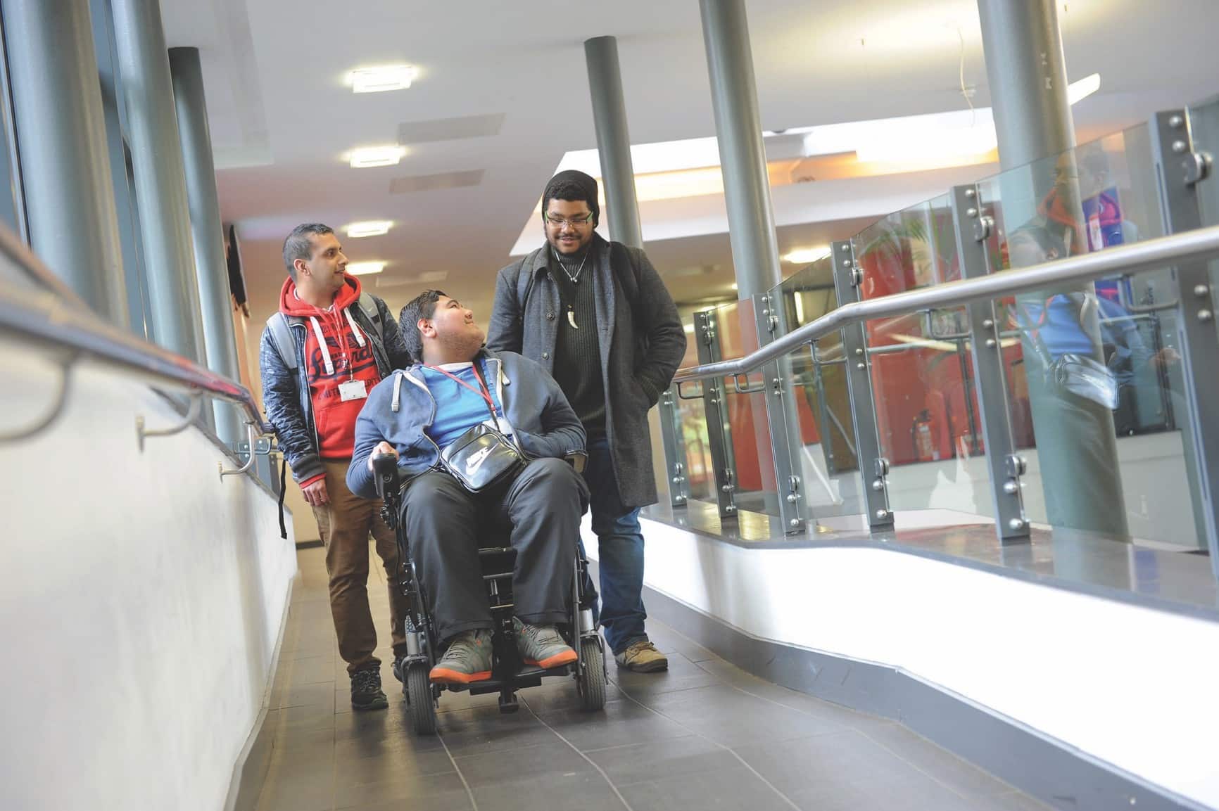 Three Solihull College students in the photo, one a wheelchair user