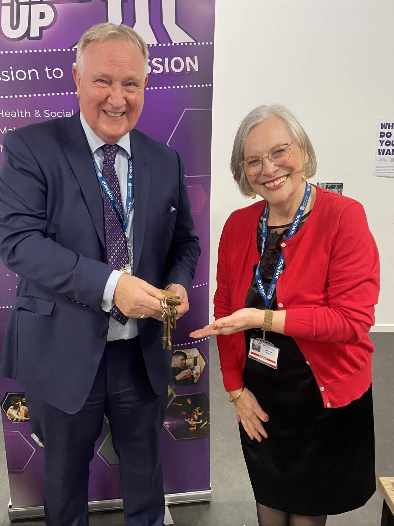 Former Solihull College chair of Governors Barbara Hughes handing over the keys to Paul Assinder