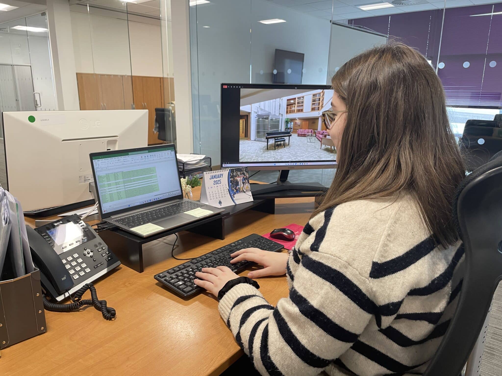 Apprentice Katie Hall at her desk at work