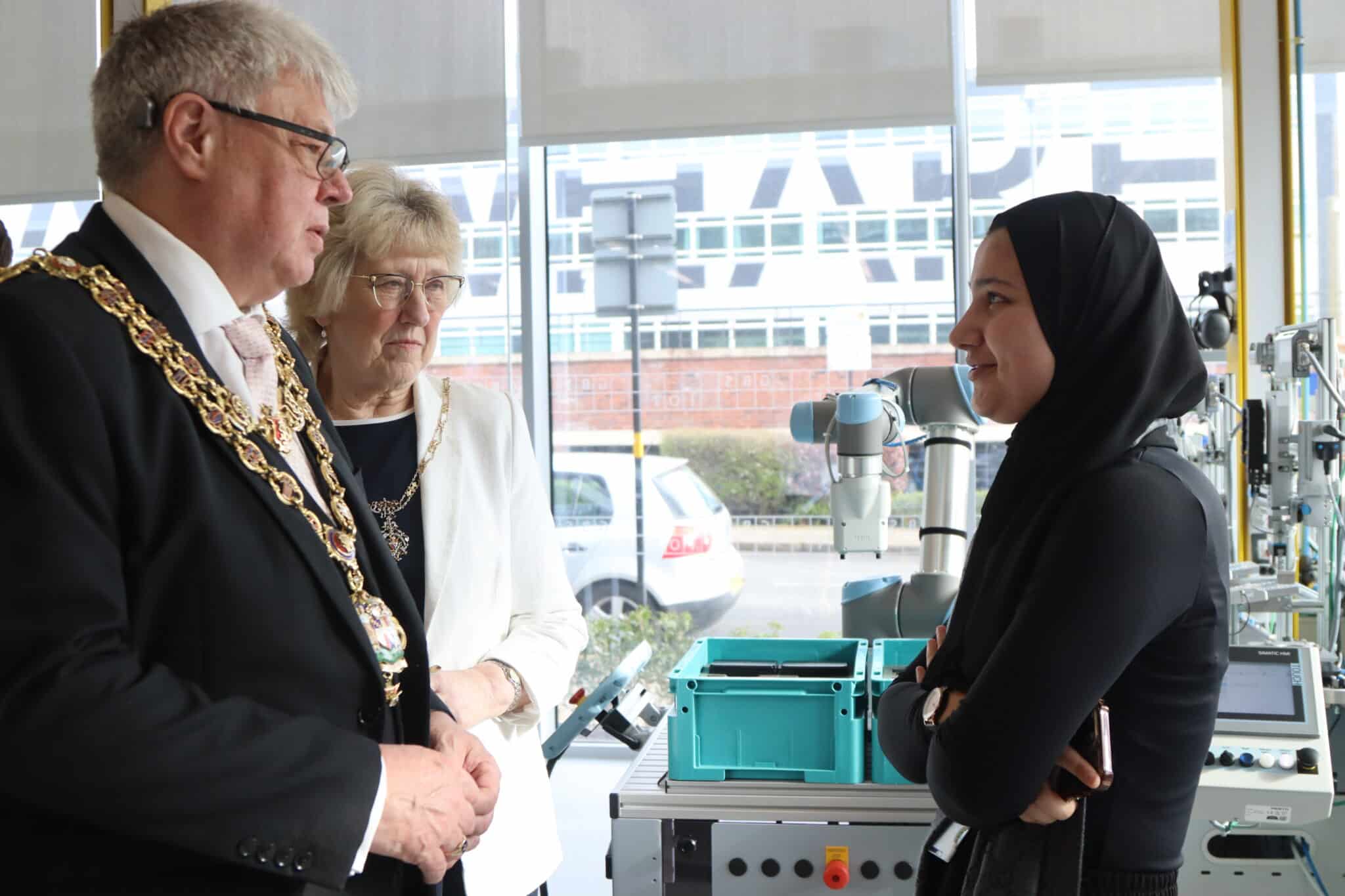 The Lord Mayor chatting to a female engineering student