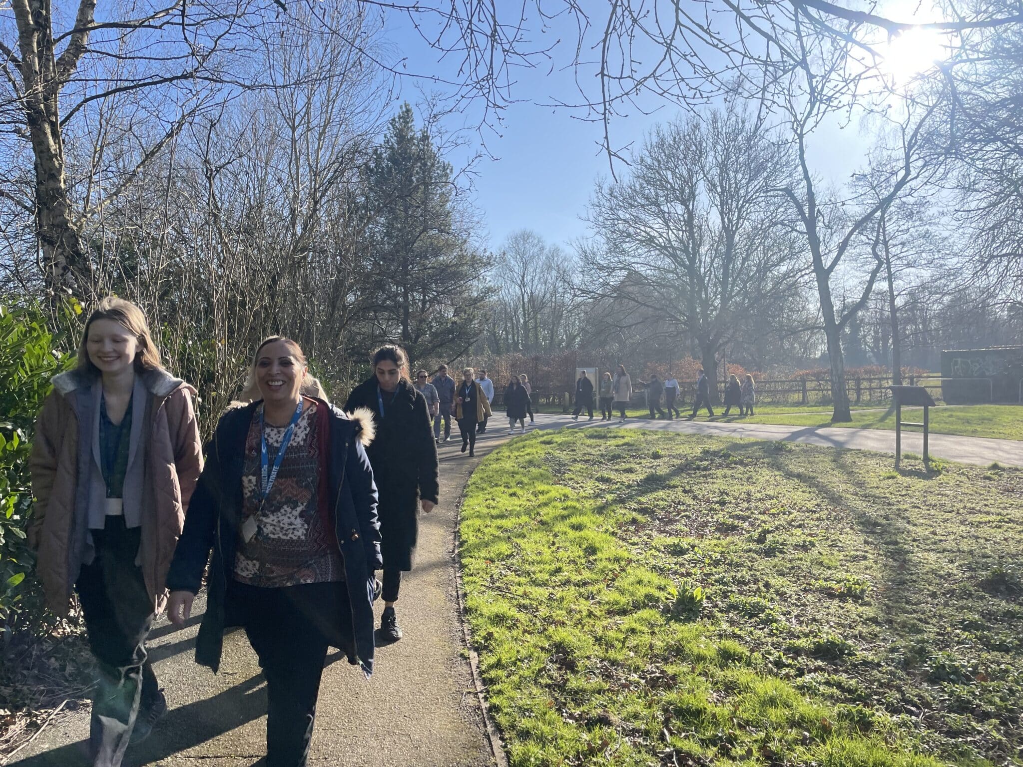 staff walking in the park